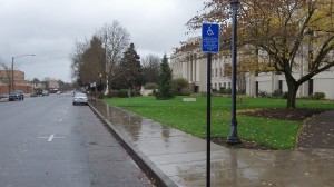 Sign marks one of the two designated spaces near the Linn County Courthouse in downtown Albany.