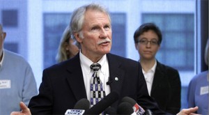 Gov. Kitzhaber, here in a photo on his official website, is taking a principled stand -- haflway.