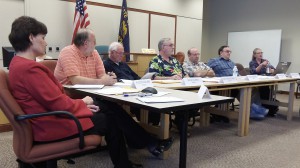 The council at a work session in April. Monday's agenda includes a health care issue.