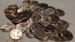 Maybe we could solve all our economic problems by just revaluing these cheap dollar coins. Let's call them a million dollars each or, what the heck, a trillion!