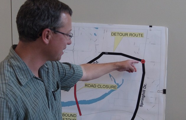 On a detour map, Chris Cerklewski points to the planned roundabout at Spring Hill and Quarry, North Albany.