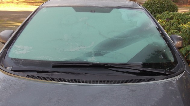 The windshield was iced over, global warming notwithstanding.